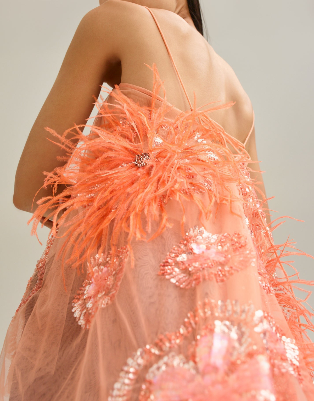FEATHER AND BEADED STRING TOP